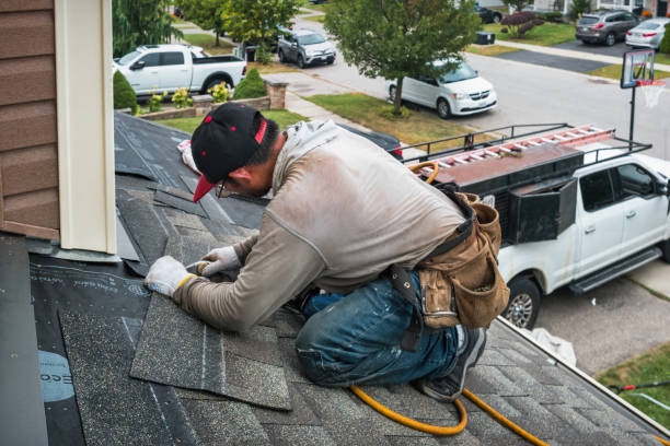 Professional Roofing technician working in Harrah, WA